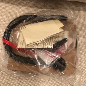 Pottery Barn cast iron tie back holders.